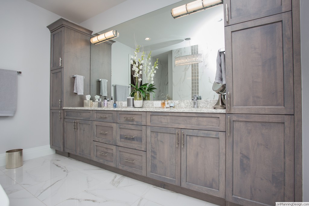 Master bathroom features custom cabinetry