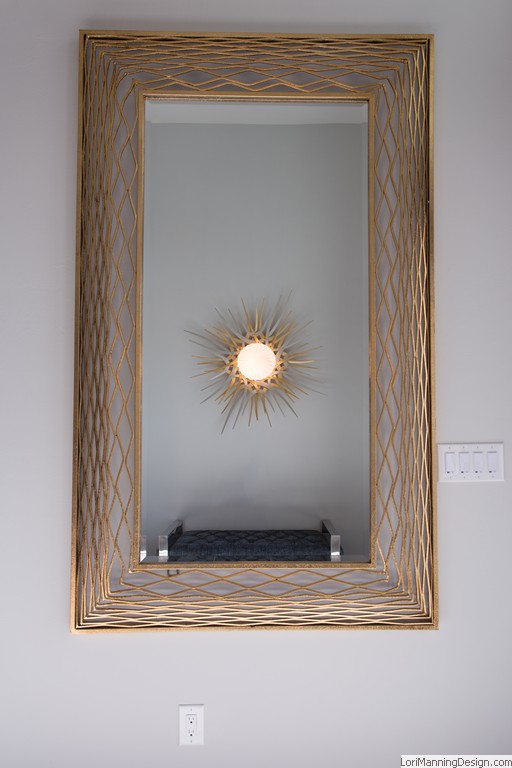 Foyer gold lighting and mirror