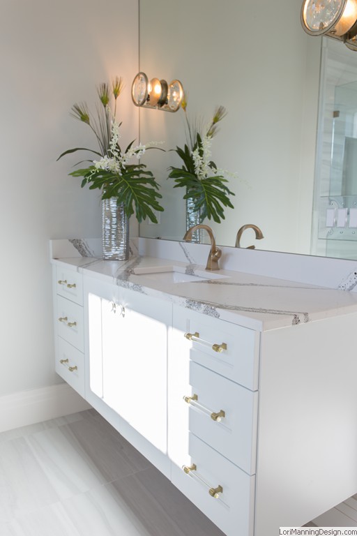 Master Bathroom - floating cabinet, quartz countertops, gold accents