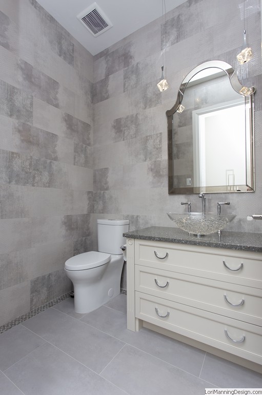 Powder bath tile wall, custom bowl sink, pendant lighting, elegant bathrooms